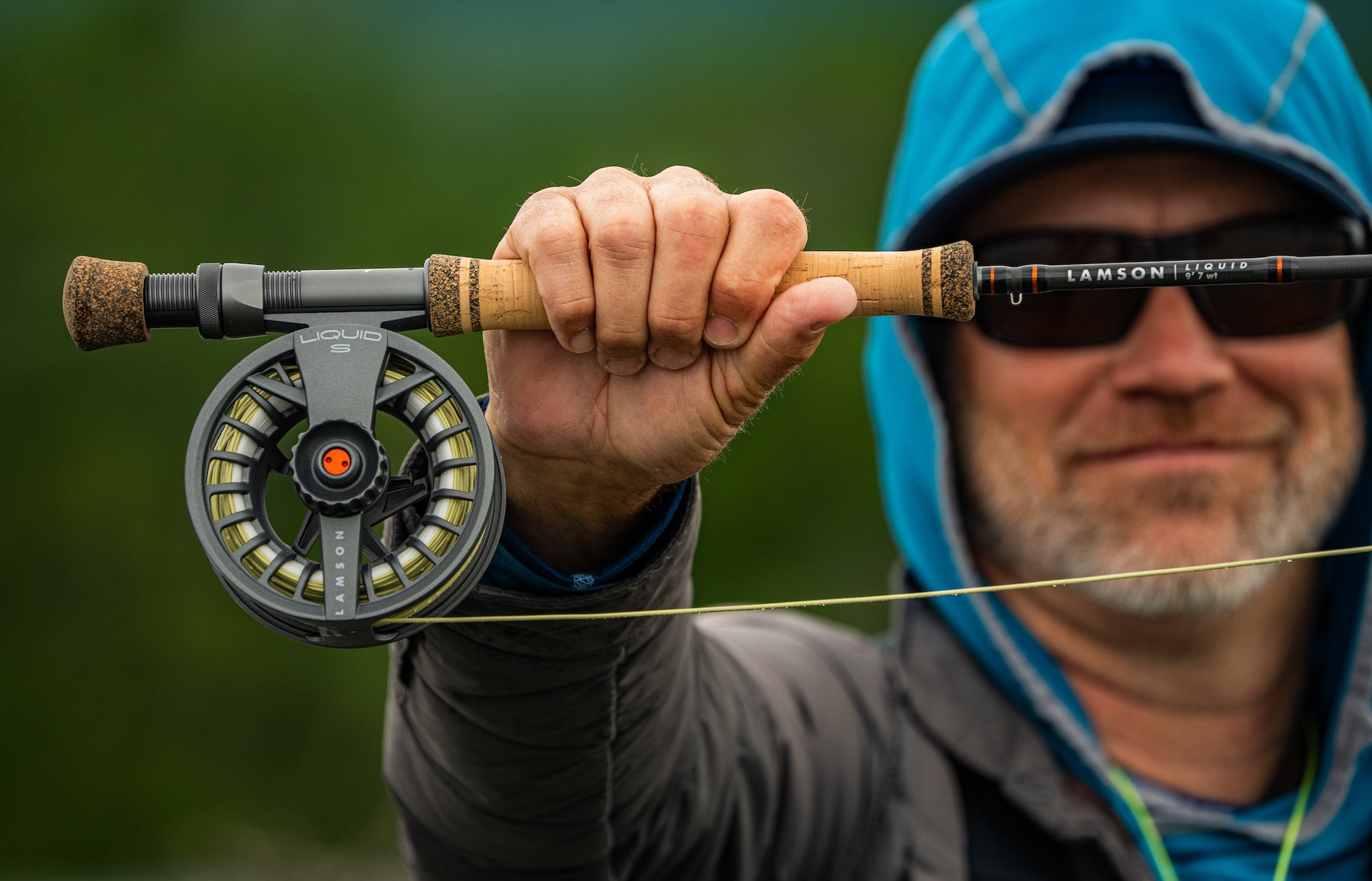 Lamson liquid rod and reel fly fishing combo being used