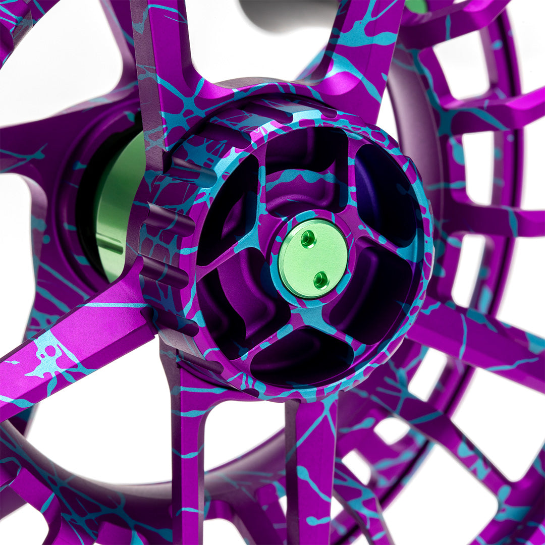 Lamson Litespeed m Wild Child Special Edition purple and blue saltwater fly fishing reel drag knob